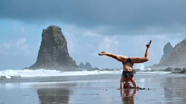 Headstand at the beach