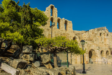 ancient antique civilization ruins of castle stone walls and arch shape windows in open air museum space for tourists and sightseeing 