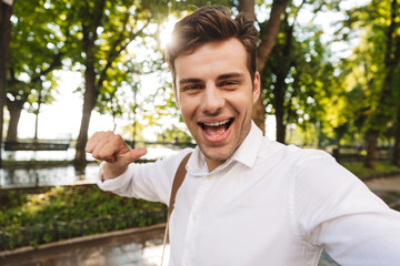Happy young businessman wearing shirt