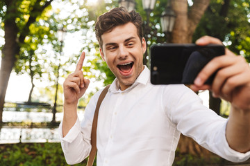 Fototapeta premium Happy young businessman wearing shirt