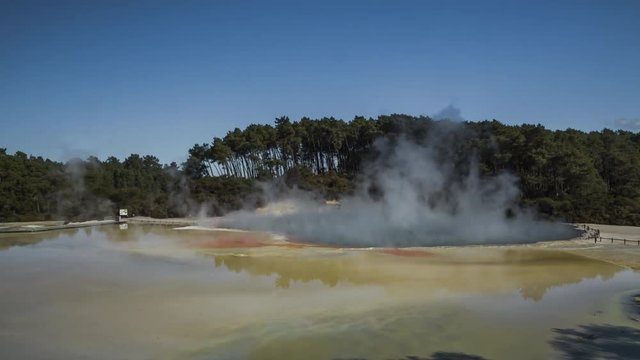 Champagne Pool in Wai-O-Tapu Thermal Wonderland in New Zealand, popular tourist attraction. Timelapse video.
