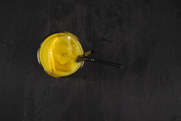 Fresh cocktail on a black background. Alcoholic and Fruit Non-alcoholic cocktails. 