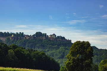 Obraz premium Beautiful view on Königstein castle from river Elbe in Saxony, Germany