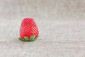 Fresh strawberry on the linen cloth