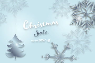 Fototapeta na wymiar Christmas time. Background with snowflakes and Christmas tree. Text : Christmas Sale