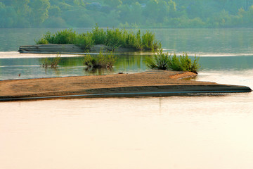 Willow trees on the meadows along the Vistula river in Mazovia region in Poland in spring season. © Art Media Factory