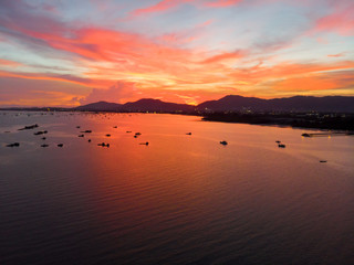 Beautiful sunset clouds sea beach aerial view