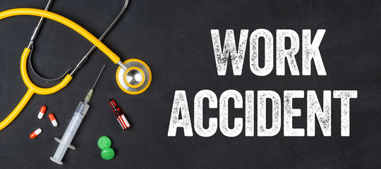 Stethoscope and pharmaceuticals on a blackboard - Work accident