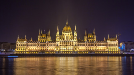 Hungarian Parliament Building on the bank of the Danube in Budapest at night