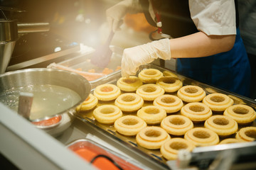 Cake making. Baumkuchen