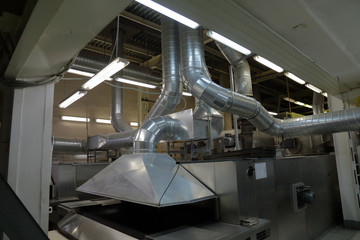 Industrial equipment and machinery at the factory of bread and sweets