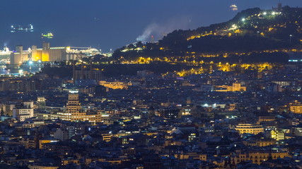 Panorama of Barcelona night timelapse, Spain, viewed from the Bunkers of Carmel