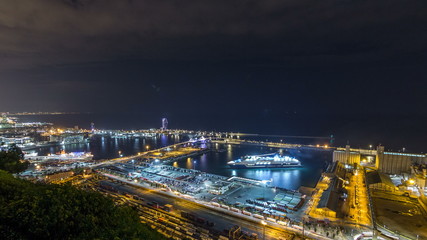 Fototapeta na wymiar Night skyline from Montjuic with Port Vell timelapse, Barcelona, Catalonia, Spain