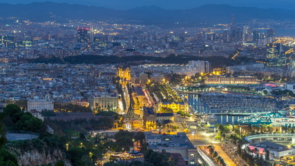 Aerial view over square Portal de la pau day to night timelapse in Barcelona, Catalonia, Spain.