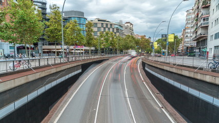 Traffic passes through an underpass on the Gran Via de les Corts Catalanes as it heads towards the...