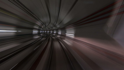 Moving in the subway tunnel with light trails inside timelapse
