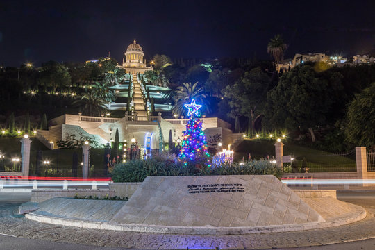 Decorated Christmas tree set on the UNESCO square for tolerance and peace in front of Bahai garden in Haifa in Israel