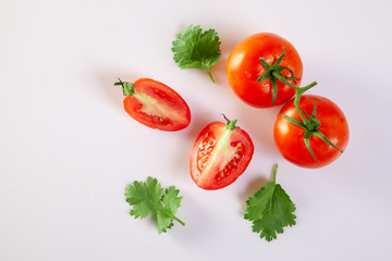 Fresh tomatoes isolated on white background.