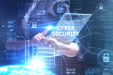 Obraz premium The concept of business, technology, the Internet and the network. A young entrepreneur working on a virtual screen of the future and sees the inscription: Cyber security