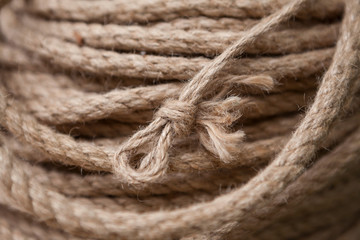 Coil of rope with marine knot loop.