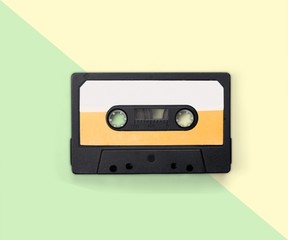 Old audio cassette isolated on white background
