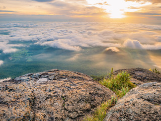 Beautiful Sunrise Sky with Sea of the mist of fog in the morning on Khao Luang mountain in Ramkhamhaeng National Park,Sukhothai province Thailand