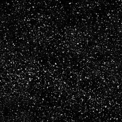 Isolated natural white snow texture effect on black night background. Winter snowflakes.