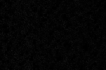 Isolated natural white snow texture effect on black night background. Winter snowflakes.