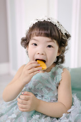 Little pretty Asian girl dressing as princess laughing portrait, healthy and happy lifestyle..