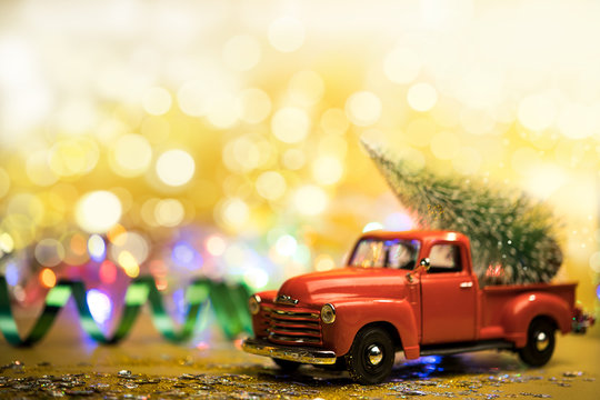 Christmas Red Truck With A Christmas Tree