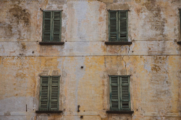 Fototapeta na wymiar windows of an old house