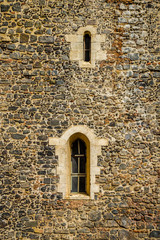 Naklejka premium old window in stone wall
