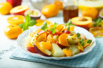 Homemade fruit salad with maple syrup dressing