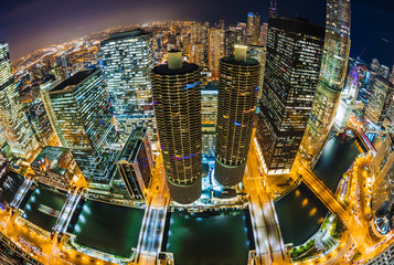 Wide angle long exposure looking down from high above the Chicago river at sunset with light trails