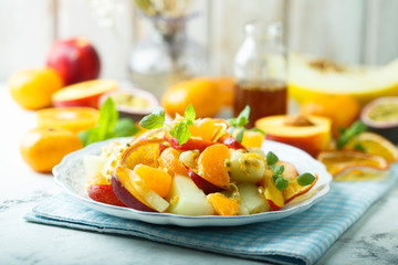 Homemade fruit salad with maple syrup dressing