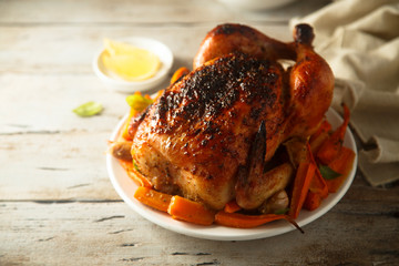 Chicken roast with root vegetables and maple syrup