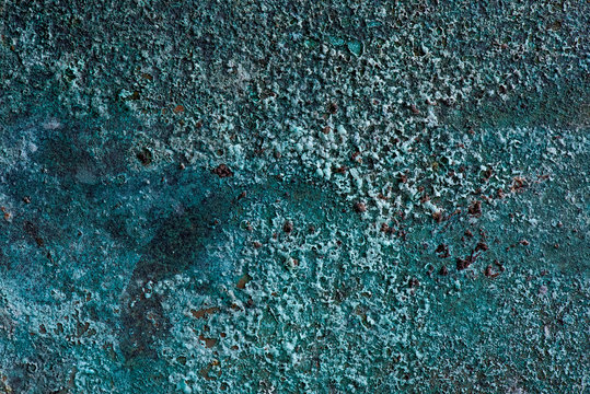 Oxidized copper background. blue texture background. Old worn metal background.