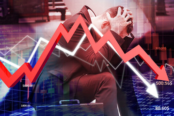 Businessman sit on the stairs and feel stressed with transparency chart price and red arrow down...