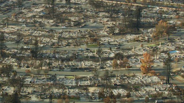 Aerial view desolation homes burned wildfire disaster California