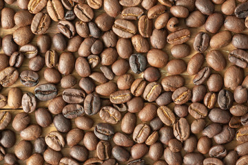 Dark and light roasted offee beans background.