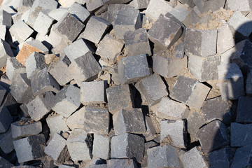 Pile of grey paving stones background