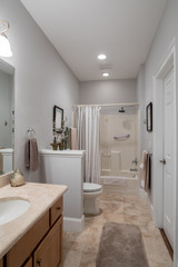 Tastfully decorated small bathroom.