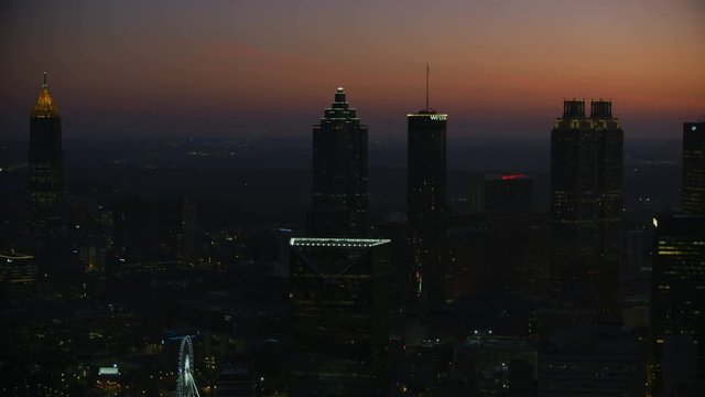 Aerial dawn sunrise illuminated downtown business district Atlanta