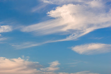 Fototapeta premium Blue sky with clouds at sunset