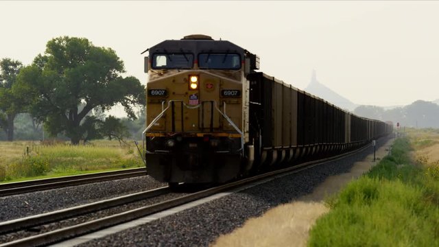 Diesel freight train locomotive near Chimney Rock Nebraska USA