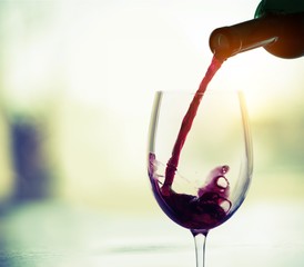 Red wine glass  on  background