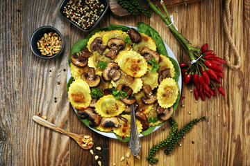 Ravioli with spinach or Pumpkin Tortellini with chard and mushrooms.