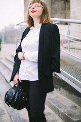 Business Women Style. Woman Going To Work Walking Downstairs. Portrait Of Beautiful Smiling Female In Stylish Office Clothes Going Old Town.