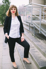 Business Women Style. Woman Going To Work Walking Downstairs. Portrait Of Beautiful Smiling Female In Stylish Office Clothes Going Old Town.