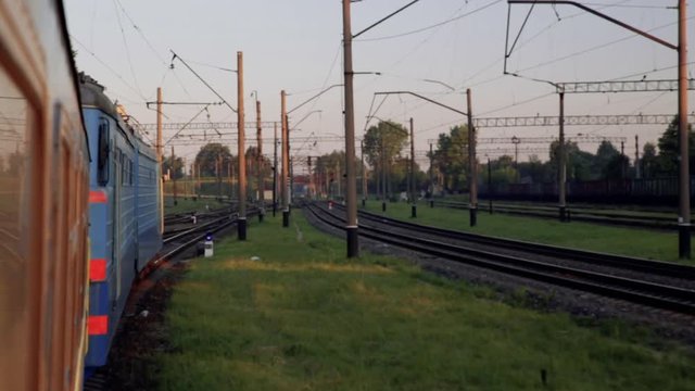 Looking out of train during sunset